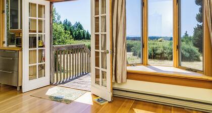 Classic farmhouse with front porch & amazing sunset views - walk to town