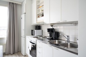 Standard Apartment, 1 Bedroom, Balcony | Private kitchenette | Full-size fridge, microwave, oven, stovetop - Hiisi Homes Helsinki Sörnäinen (Helsinki)