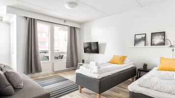 Family Apartment, 1 Bedroom, Balcony | 1 bedroom, blackout drapes, soundproofing, iron/ironing board