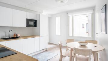 Standard Apartment, 2 Bedrooms, Balcony | Private kitchen | Full-size fridge, microwave, oven, stovetop