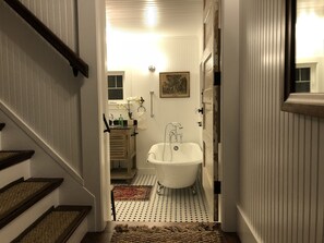 Bathtub, hair dryer, towels, soap