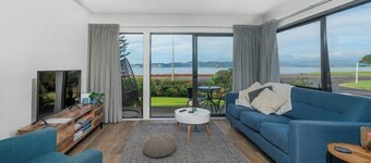 Modern beach front apartment at Aqua Soleil complex with lap pool & spa.