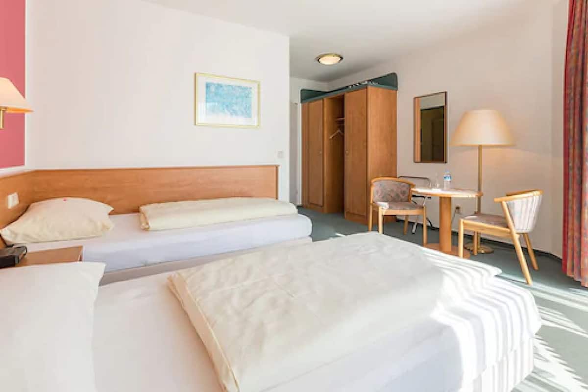 Minibar, in-room safe, desk, rollaway beds