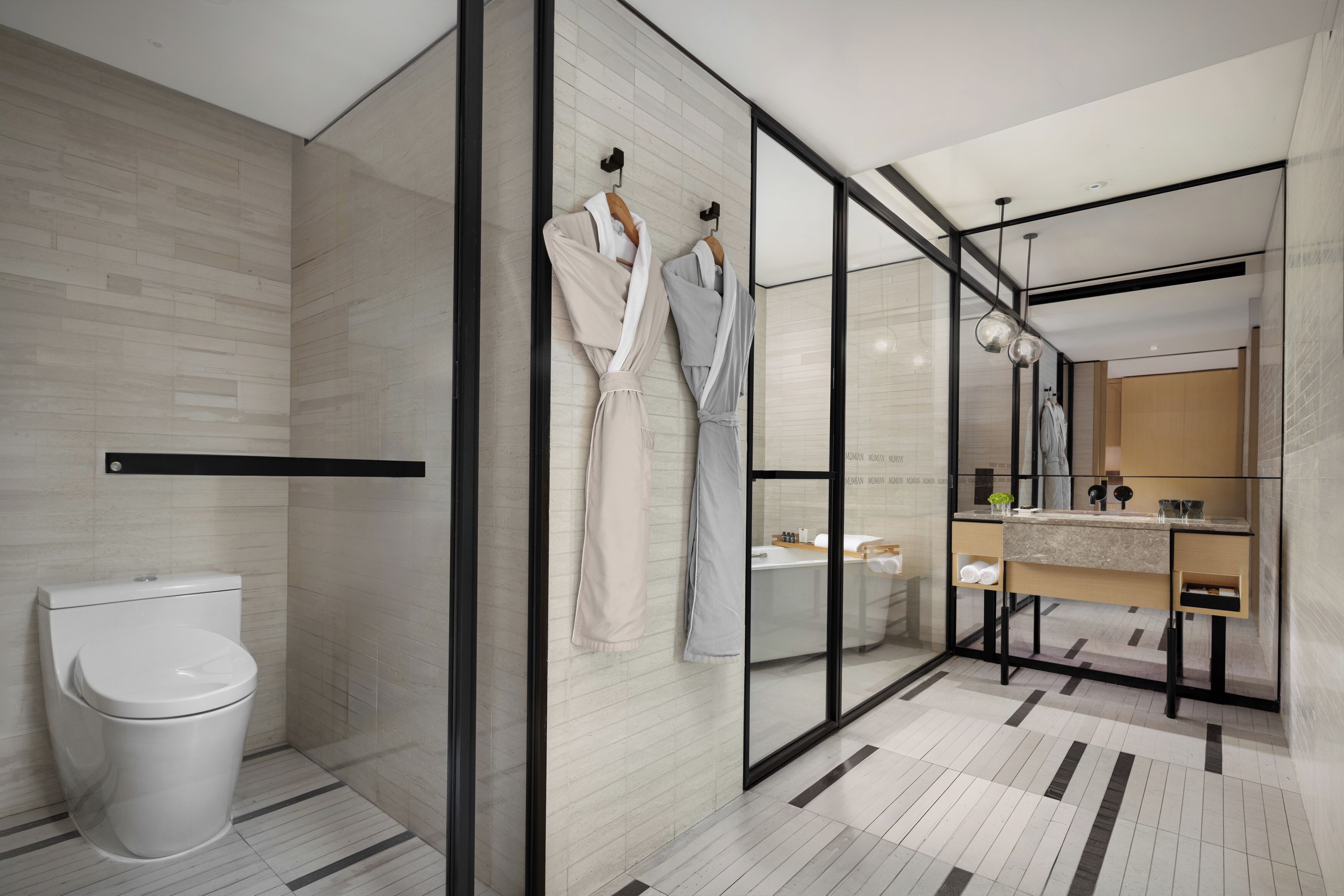 business suite | bathroom | free toiletries, hair dryer, bathrobes, slippers