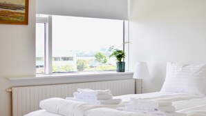 シグネチャー アパートメント クイーンベッド 1 台 | 部屋からの景観