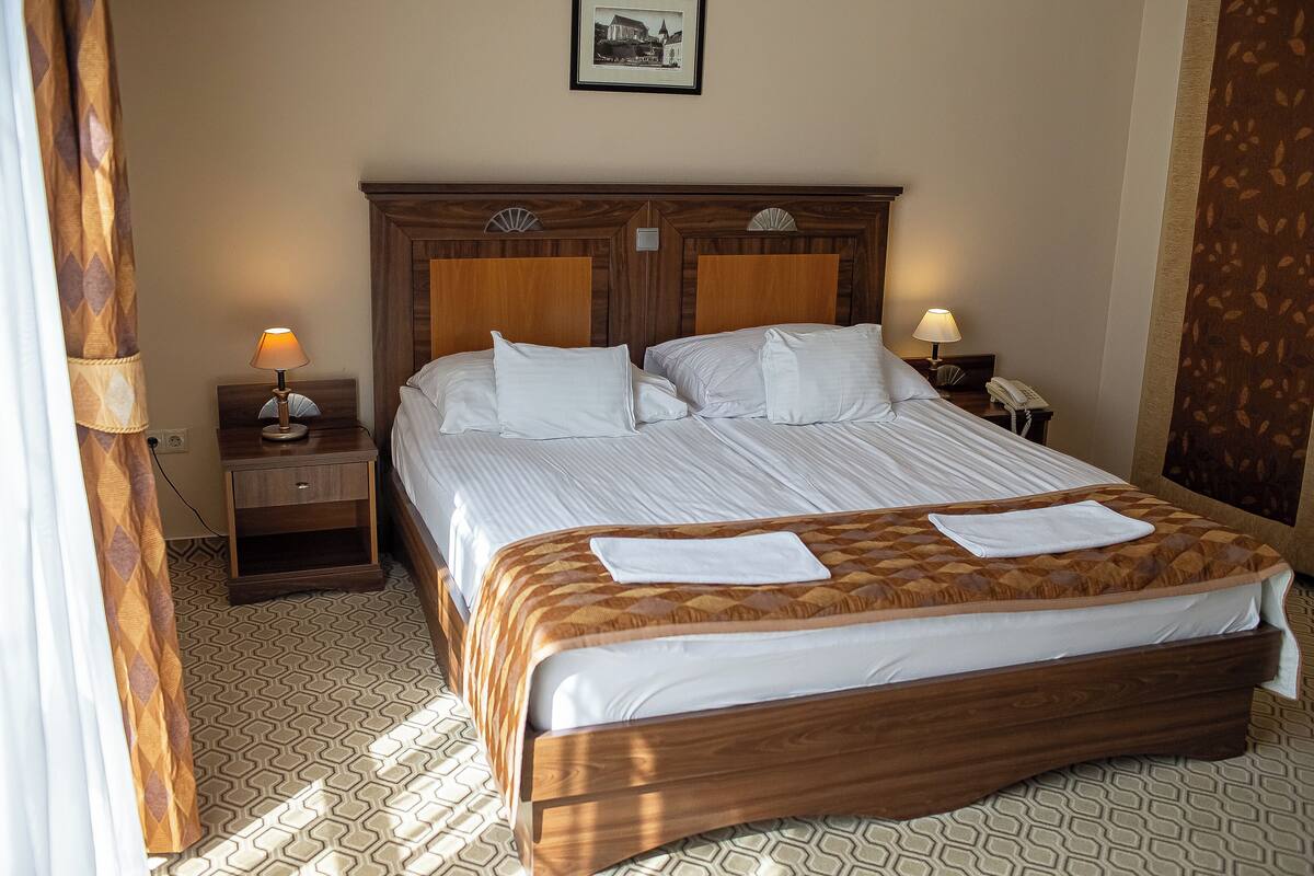 Ropa de cama de alta calidad y minibar 