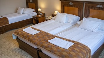 Basic Triple Room | Premium bedding, minibar, in-room safe, desk