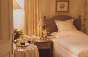 Desk, blackout drapes, iron/ironing board, cribs/infant beds