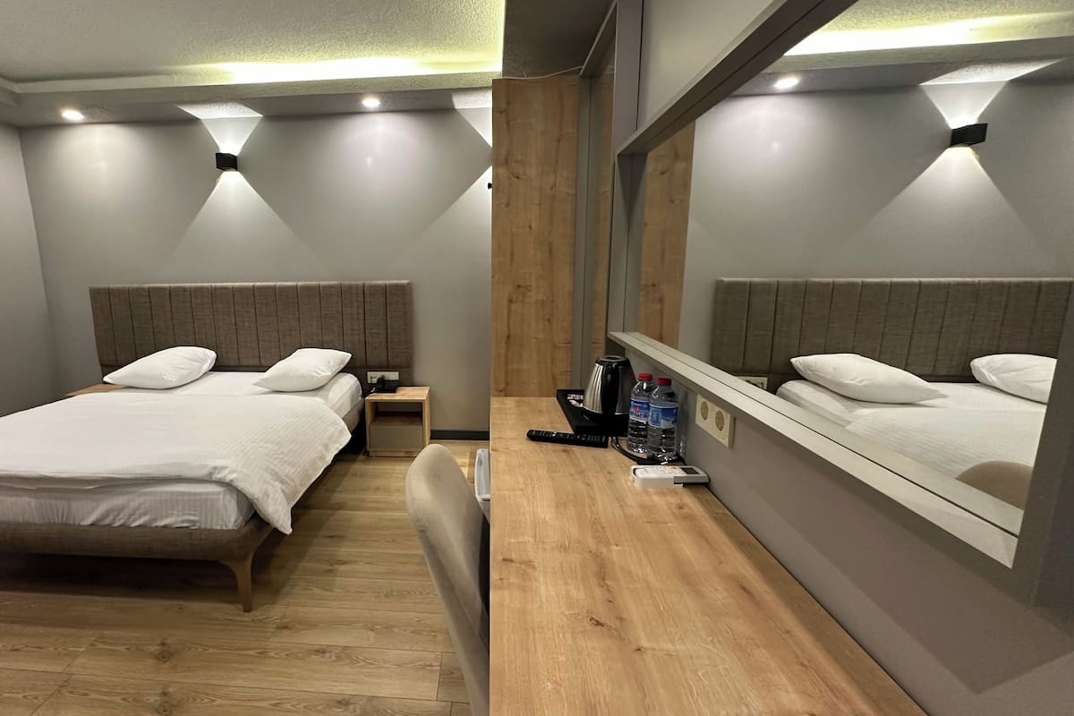 Economy Double Room | Premium bedding, desk, laptop workspace, blackout drapes