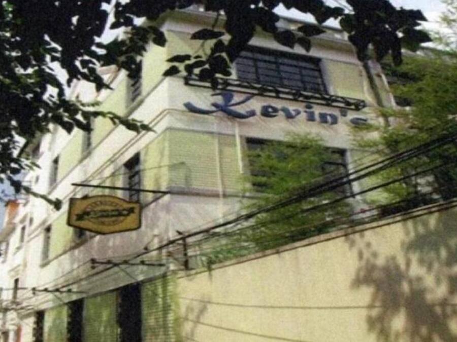 A building with a sign that reads "Kevin's."