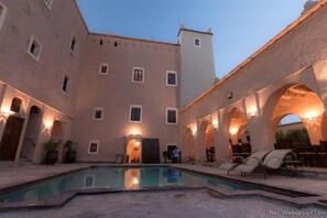 Outdoor pool, pool umbrellas, pool loungers