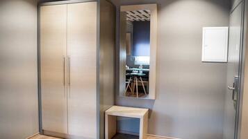 Deluxe Triple Room, Non Smoking | Living area | 40-inch flat-screen TV with satellite channels, TV