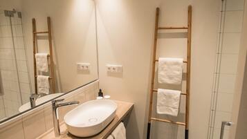 Hair dryer, towels, shampoo