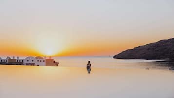 Indoor pool, outdoor pool, pool umbrellas, sun loungers