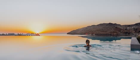 Indoor pool, outdoor pool, pool umbrellas, sun loungers