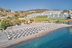 On the beach, black sand, free beach shuttle, sun-loungers