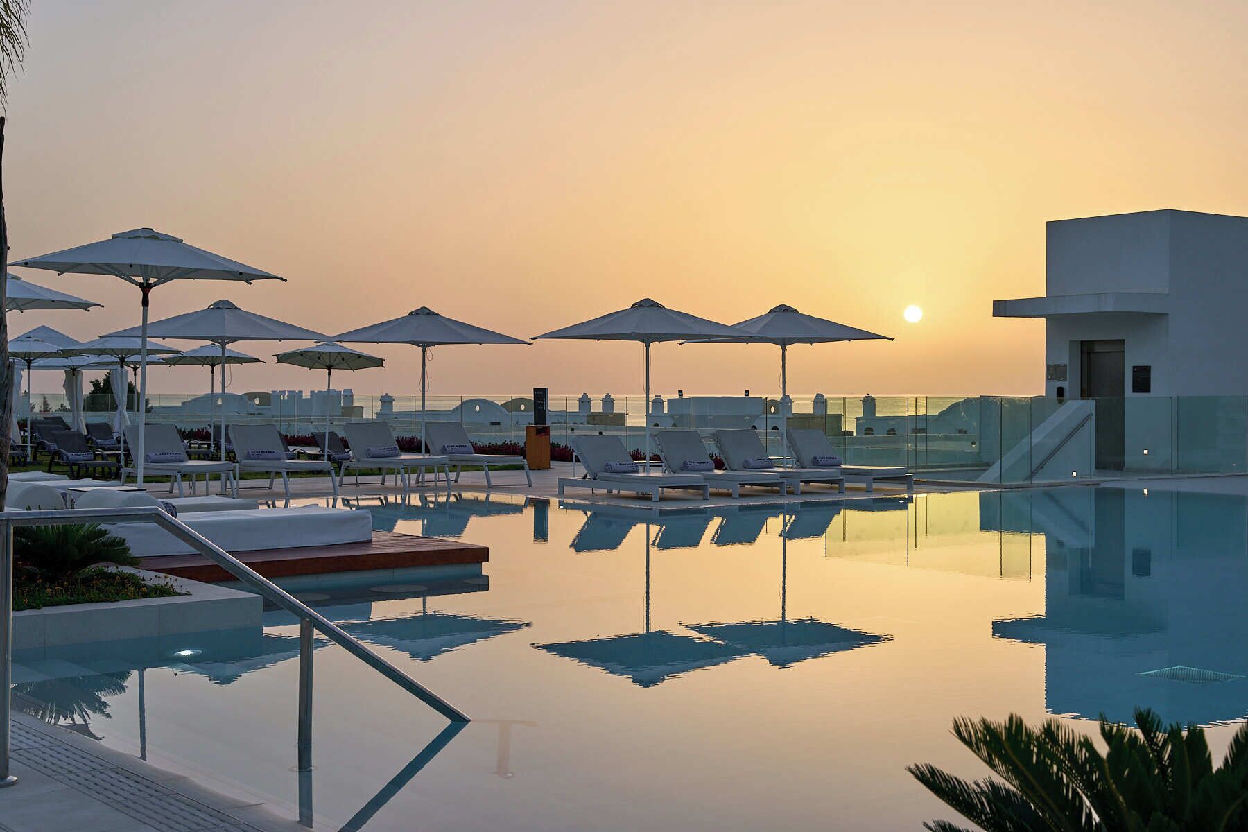 Indoor pool, outdoor pool, pool umbrellas, sun loungers