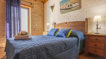 House, 2 Bedrooms | Desk, blackout curtains, free cots/infant beds, bed sheets