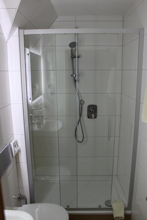Shower, free toiletries, hair dryer, towels