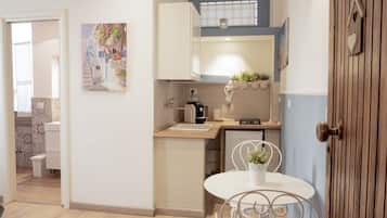 Monolocale Superior | Cucina privata | Frigorifero, prodotti per la pulizia