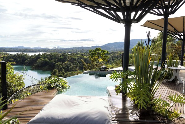 2 outdoor pools, open 10:00 AM to 7:00 PM, pool loungers