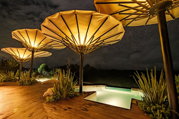2 outdoor pools, open 10:00 AM to 7:00 PM, pool loungers