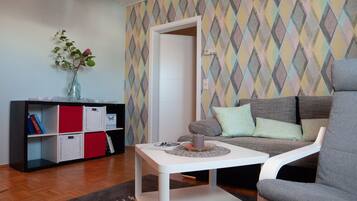 Studio Apartment | Living area | Flat-screen TV