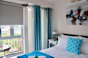 Standard Condo, 1 Queen Bed, City View | 1 bedroom, desk, blackout drapes, free WiFi - Ohana at Tagaytay Prime (Tagaytay)