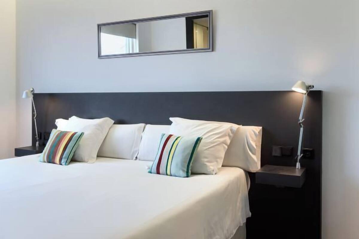 Down duvets, memory-foam beds, in-room safe, desk