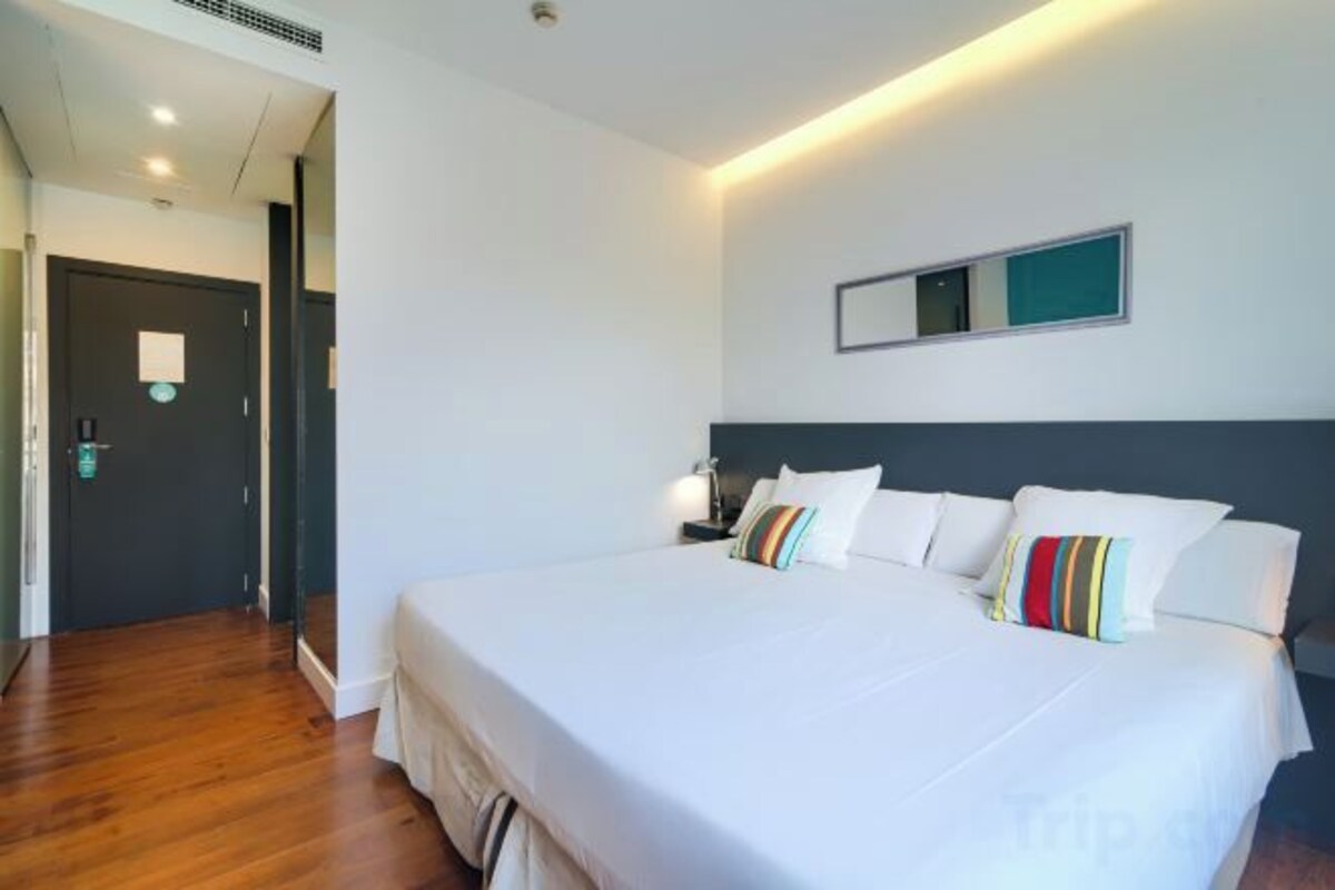 Down duvets, memory-foam beds, in-room safe, desk
