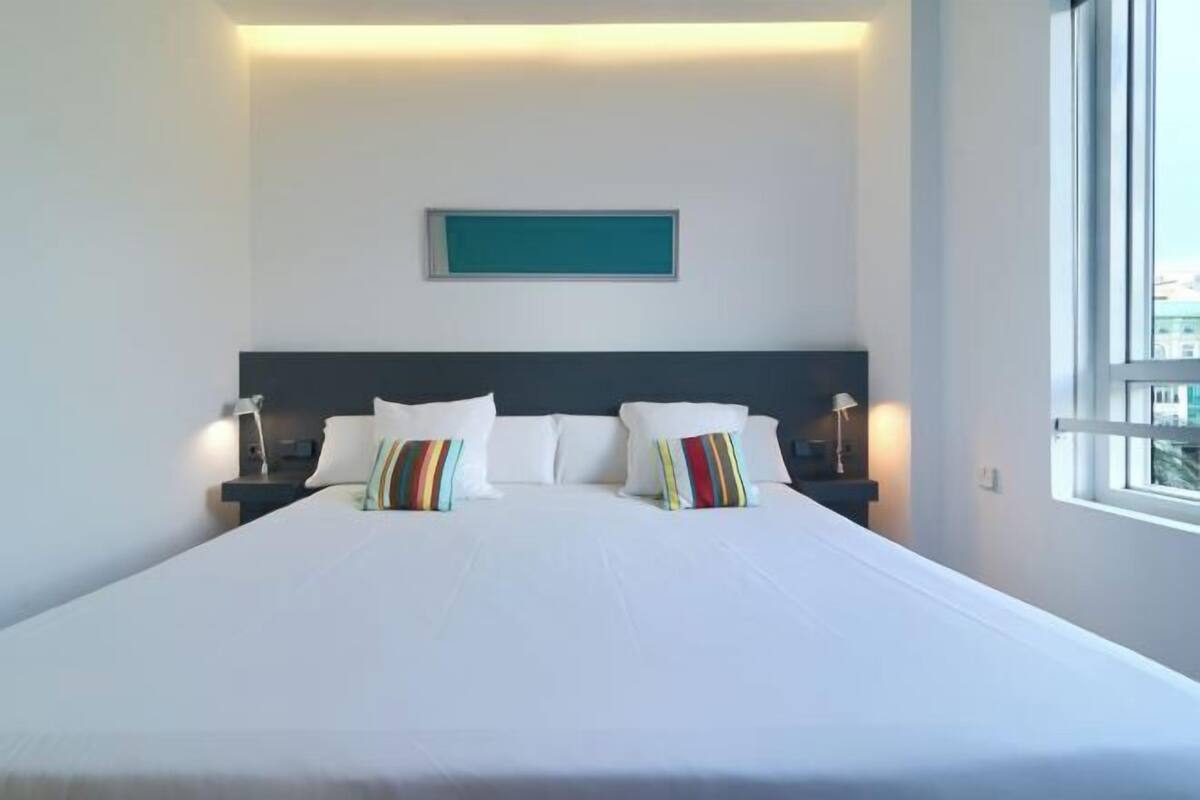 Down duvets, memory-foam beds, in-room safe, desk