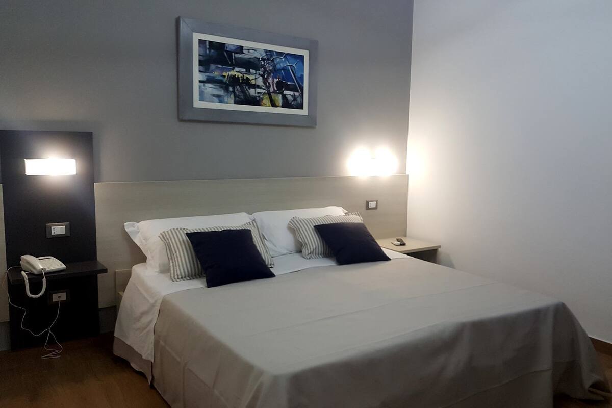 Chambre Deluxe Double ou avec lits jumeaux | Bureau, chambres insonorisées, Wi-Fi gratuit, draps fournis