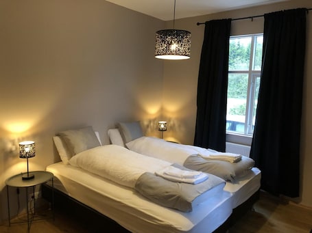 Double or Twin Room, Private Bathroom | Minibar, desk, laptop workspace, blackout drapes