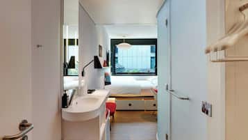 Premium bedding, down duvets, pillow-top beds, in-room safe