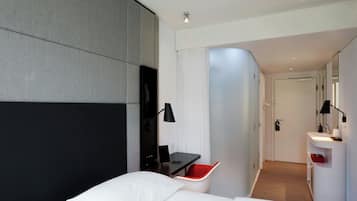 Premium bedding, down duvets, pillow-top beds, in-room safe