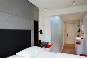 Premium bedding, down duvets, pillow-top beds, in-room safe