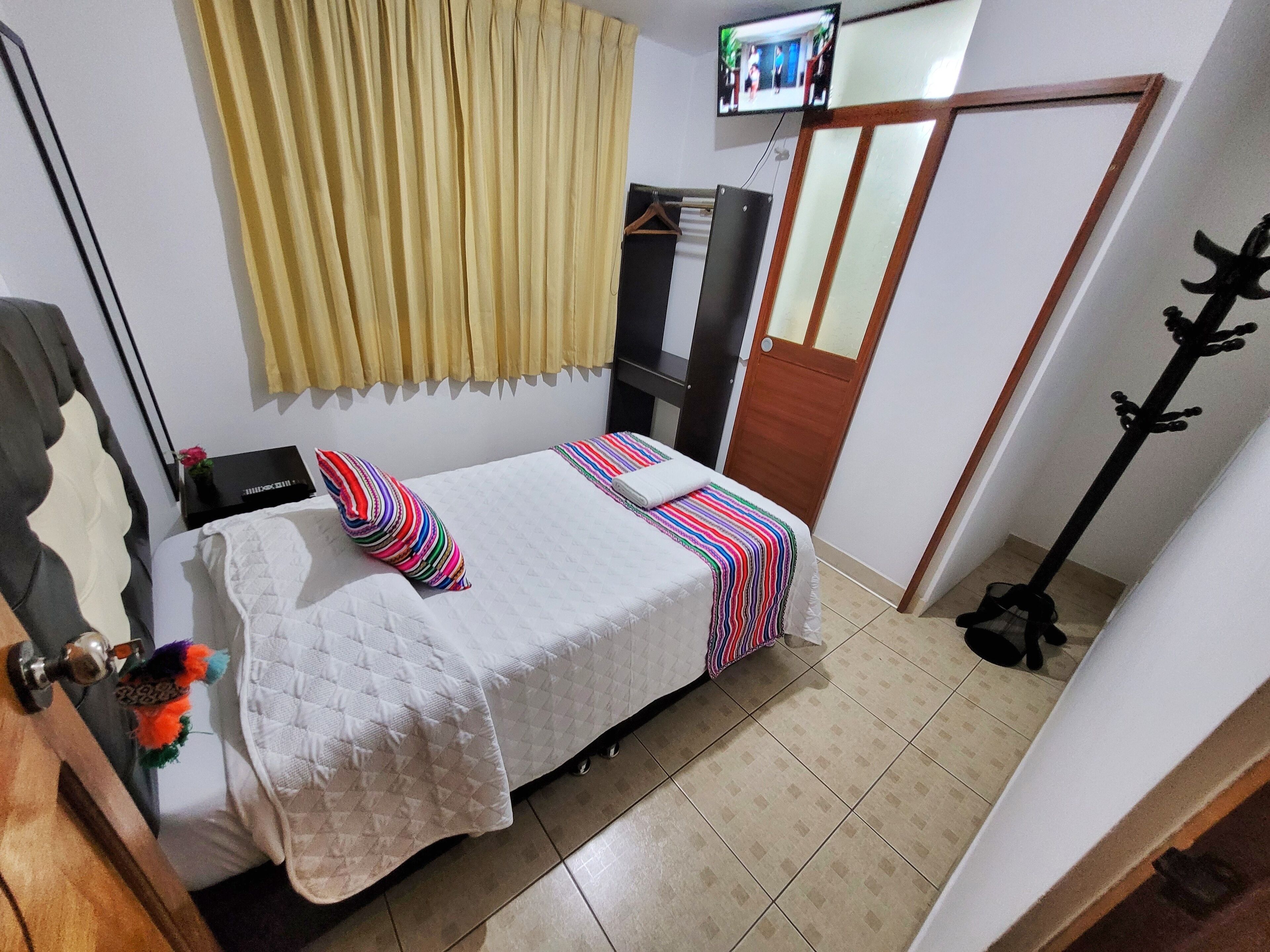 single room with private bathroom | premium bedding, down duvets, memory-foam beds, individually decorated