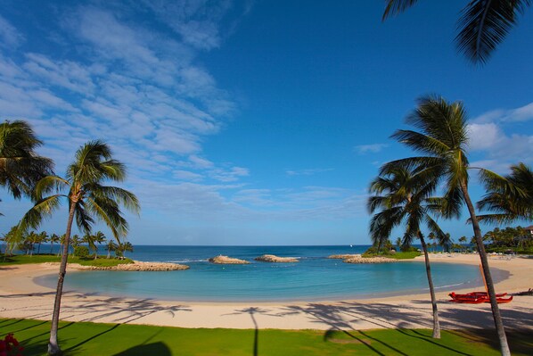 On the beach, sun loungers, beach towels