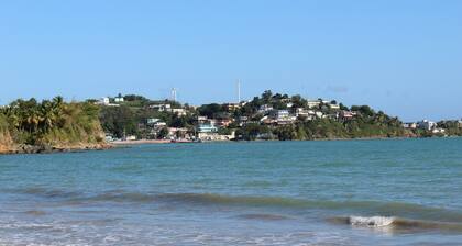 Steps away from a soft sand beach and warm waters