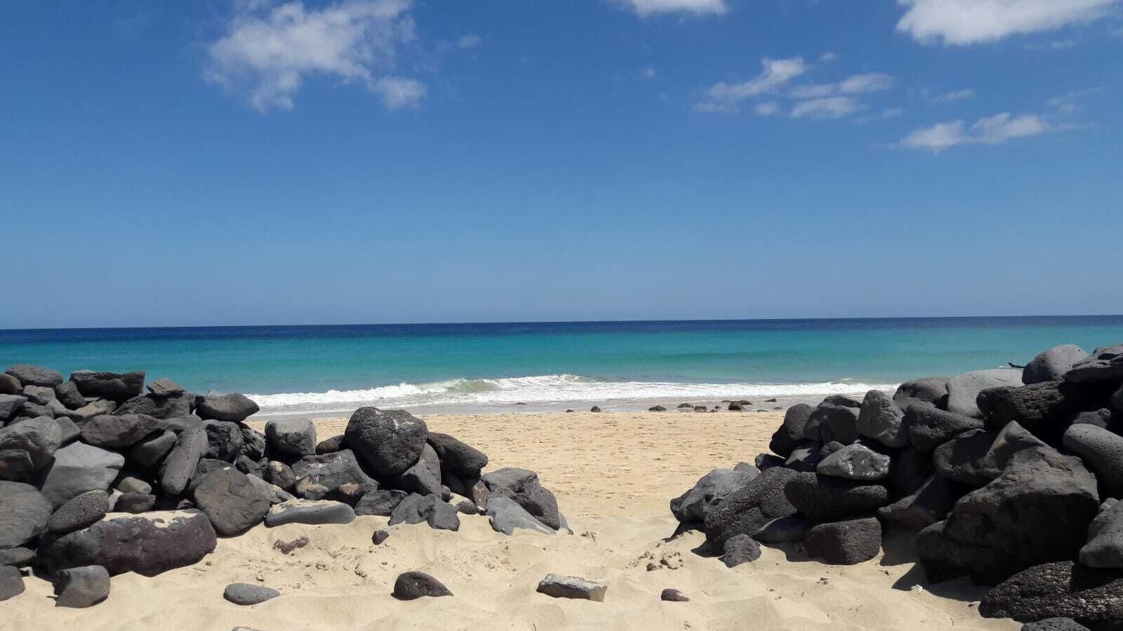 Una spiaggia nelle vicinanze, teli da spiaggia