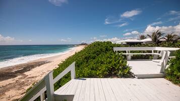 On the beach, sun loungers, beach towels