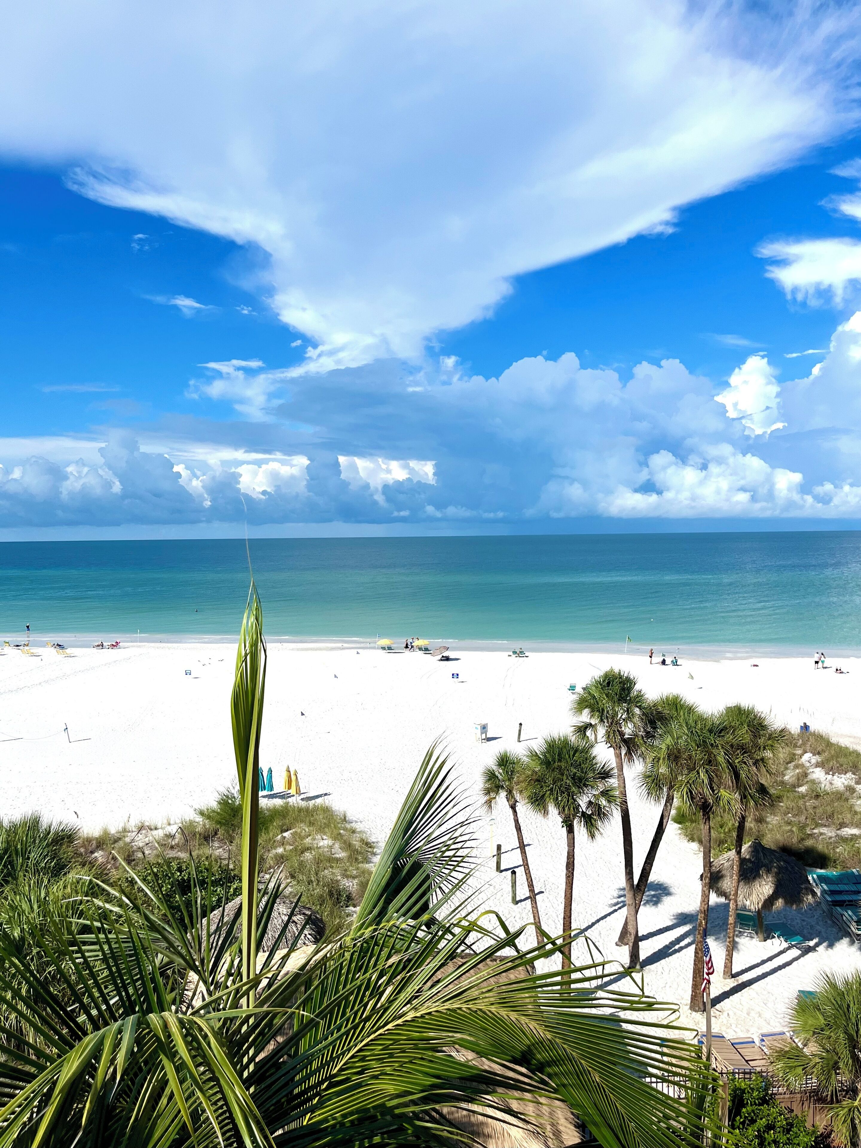 On the beach, sun loungers, beach towels