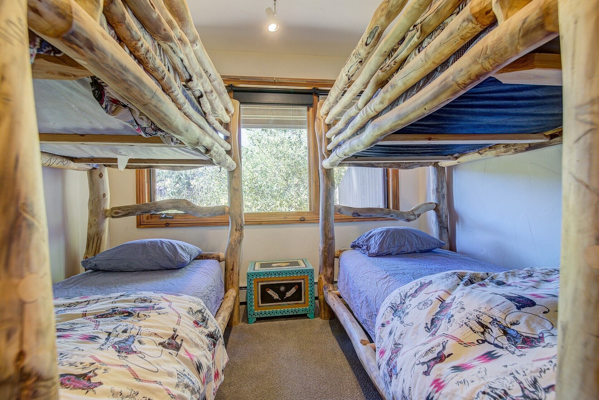 Bunk Room with window views out to the riverside.