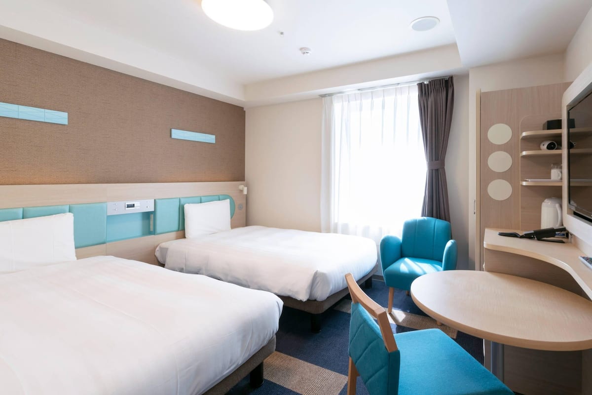 Standardrum - icke-rökare (2 signles) | Sängtillbehör av högsta kvalitet och värdeförvaringsskåp på rummet