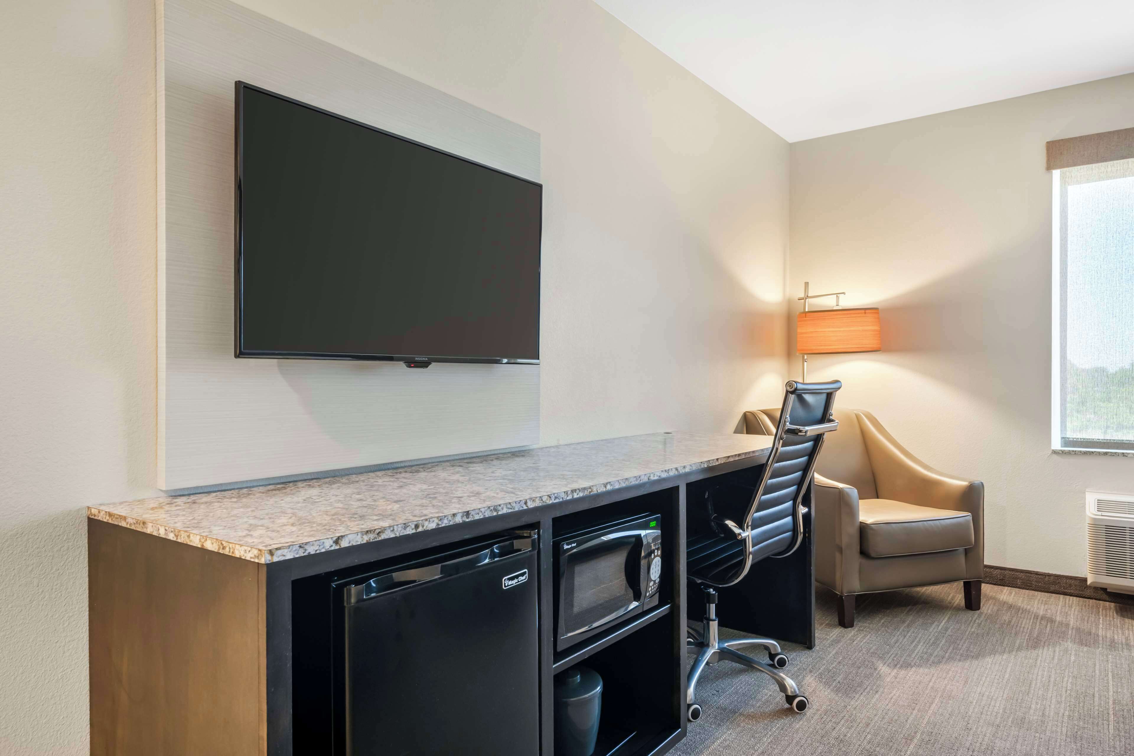 premium bedding, desk, laptop workspace, blackout curtains