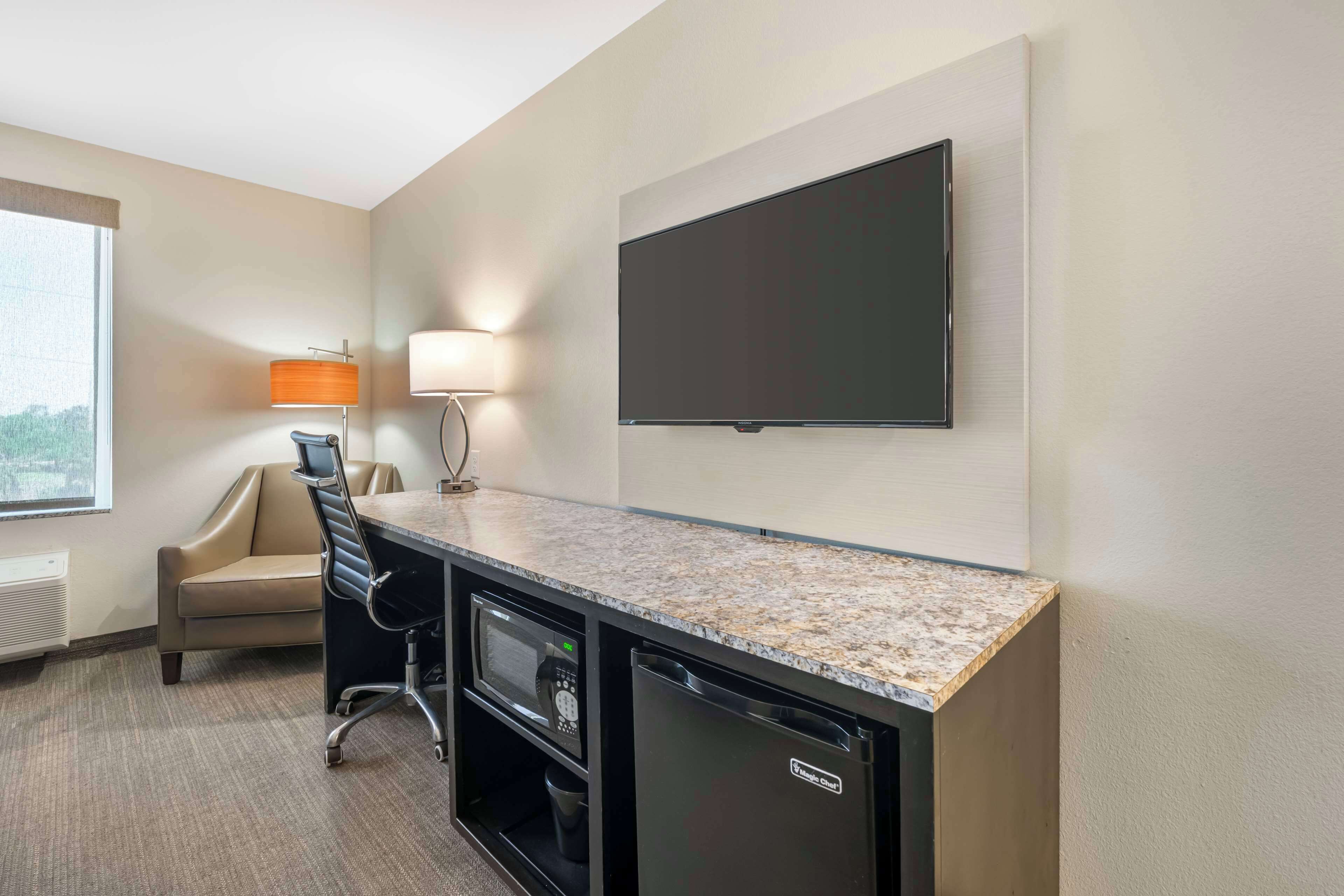 premium bedding, desk, laptop workspace, blackout curtains