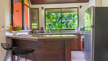 Coffee/tea maker, fridge, microwave, oven