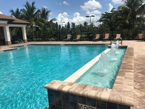 Outdoor pool, a heated pool - Modern furnished large 3 Bedroom Plus Office in Gated Community Near Beaches (Bonita Springs)