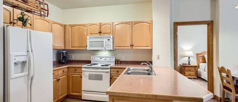 Fridge, microwave, dishwasher, coffee/tea maker