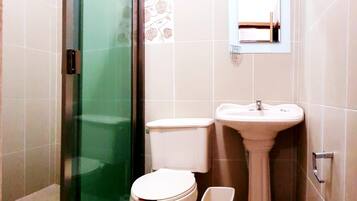 Shower, hair dryer, towels, soap